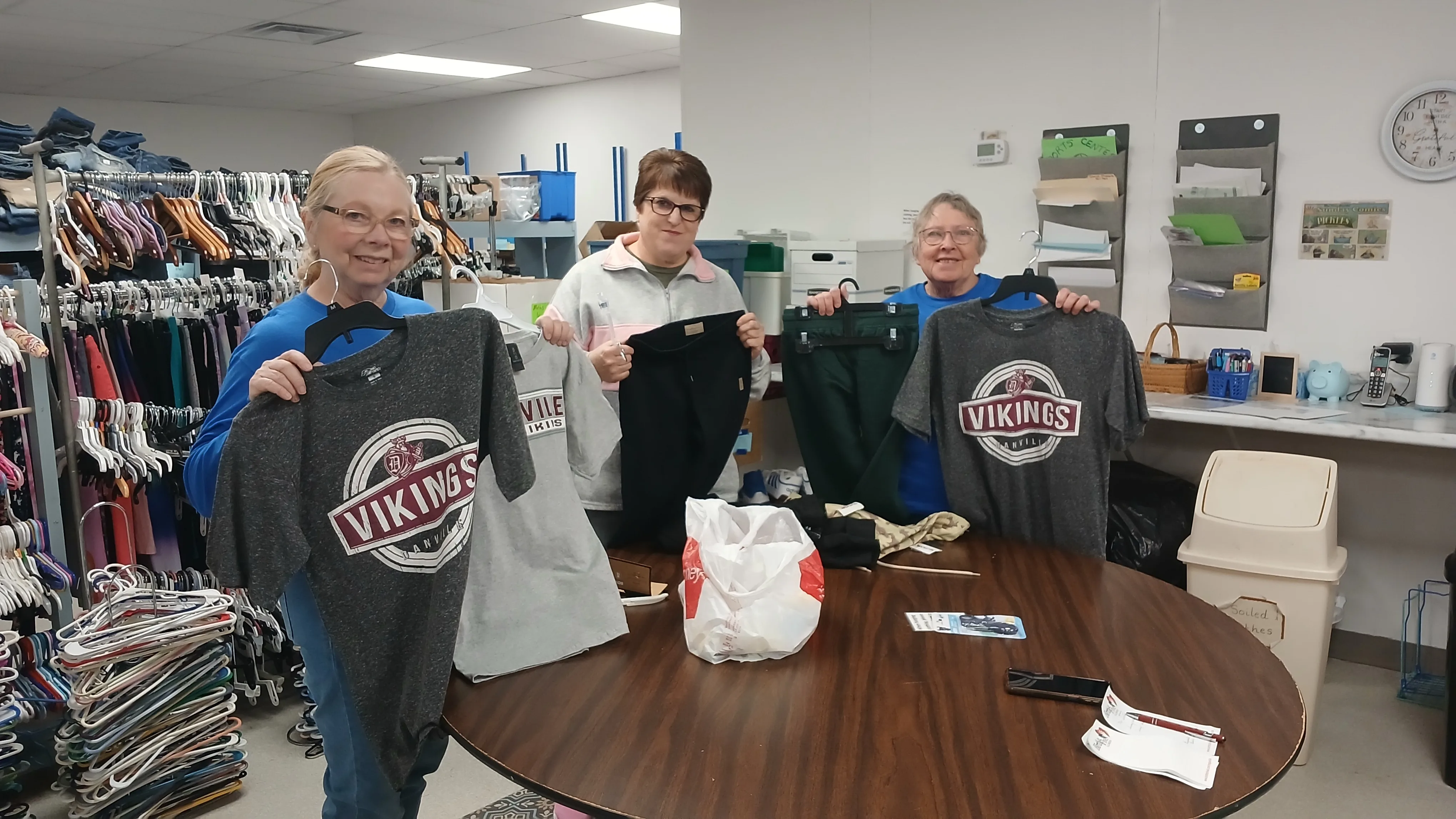 Volunteers sorting donated clothing